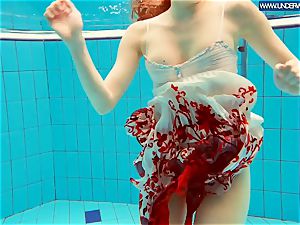 sizzling polish red-haired swimming in the pool